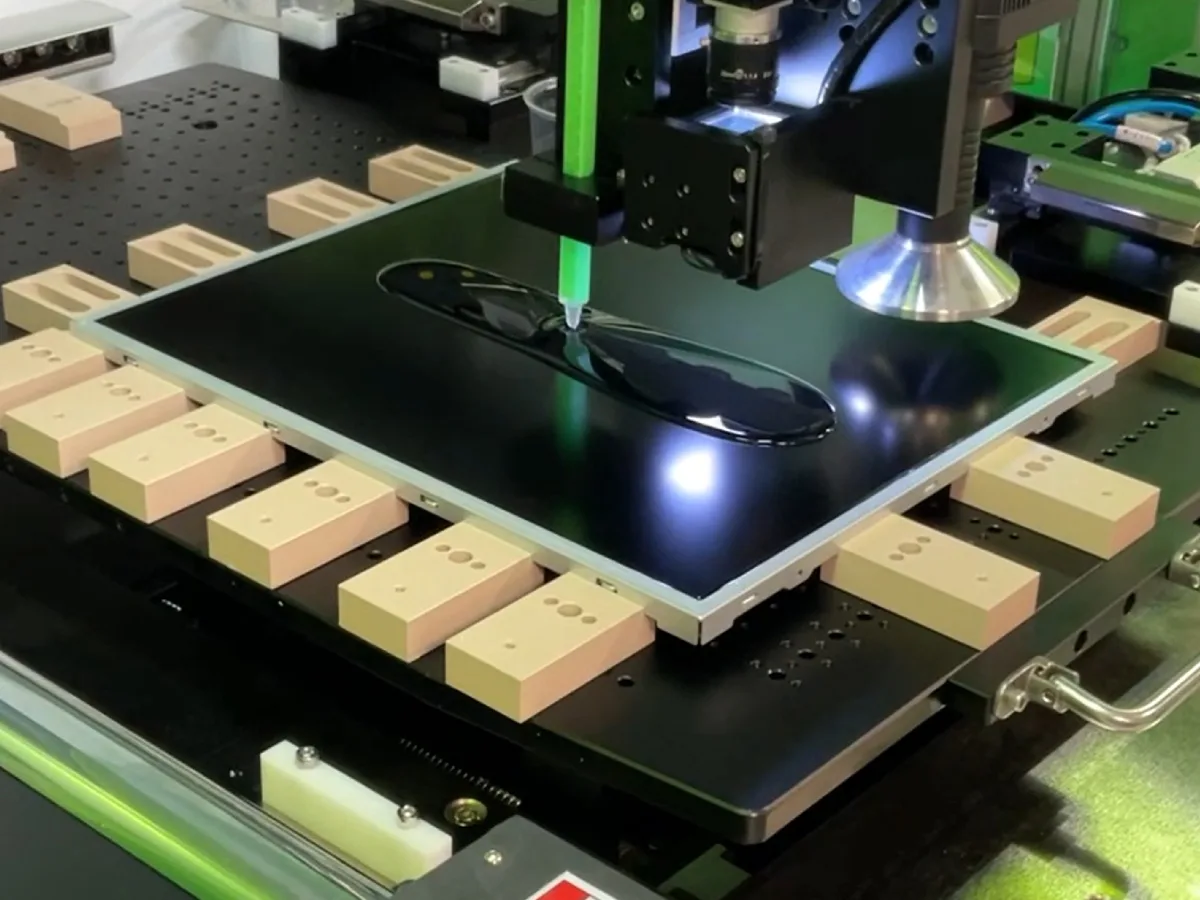 OCR optical bonding adhesive dispensed onto a display panel