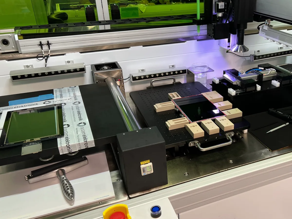 Dispensing and alignment equipment used in optical bonding production